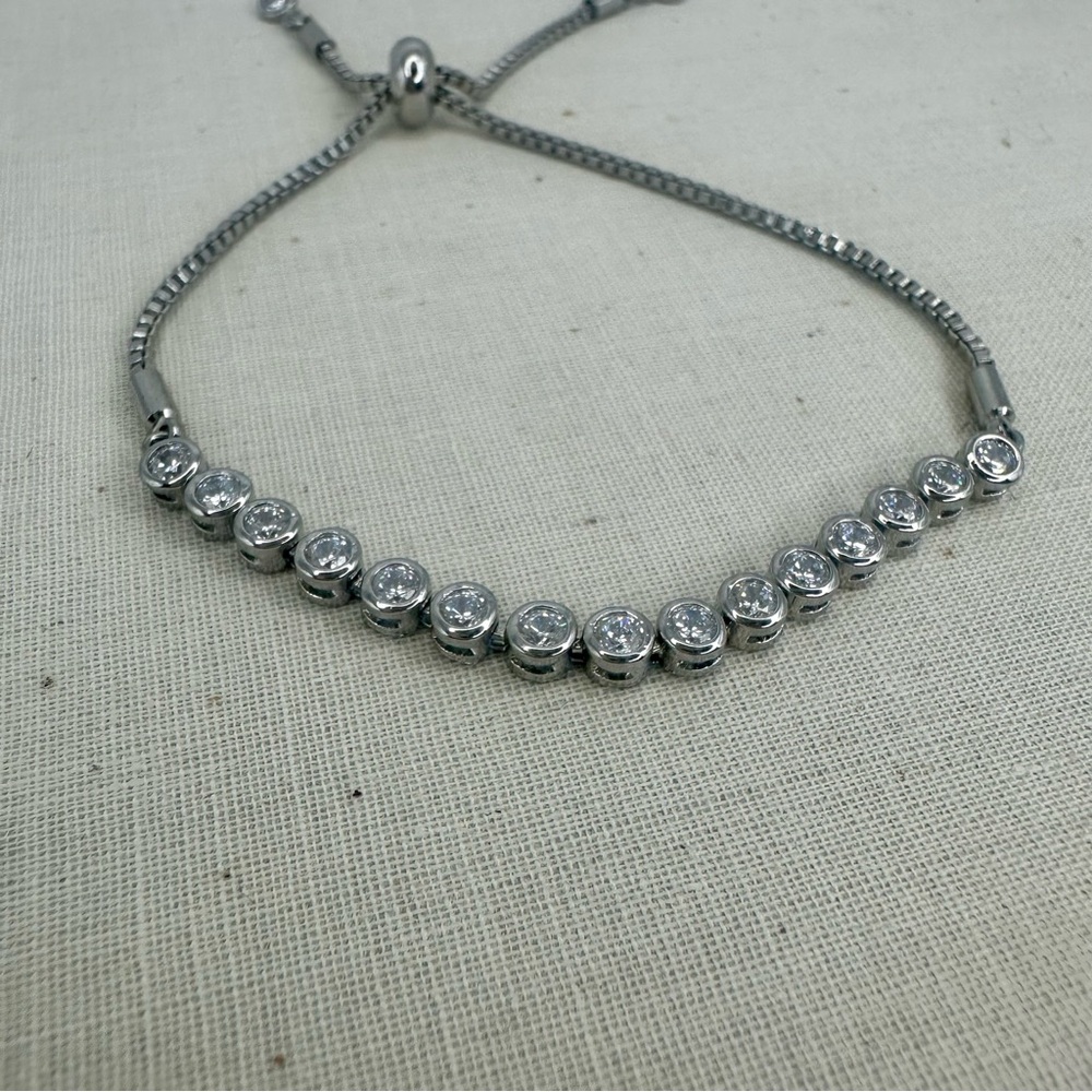Classic Tennis Silver Tone Adjustable Bracelet with Crystals - Picture 6 of 6